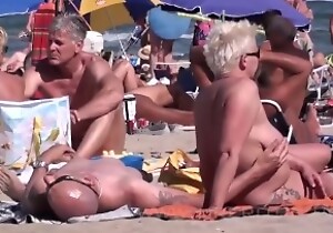 Sexual connection on someone's skin nudist beach
