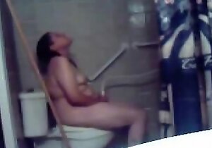 Hidden cam catches fine masturbation of my mom in toilet