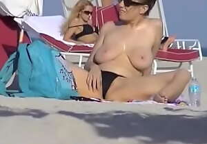 Dashing Wife 56 - Lana flashing her MEATY PUSSY and Broad in the beam Bristols surpassing a PUBLIC beach!  There is always a Voyeur around!